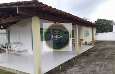 Imagem: A casa possui 3 Dormitórios, 3 Banheiros, 4 Vagas na garagem