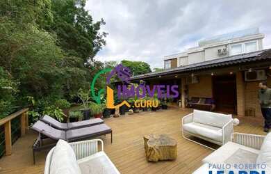 Imagem: A casa em condomínio possui 5 Dormitórios, 5 Banheiros, 4