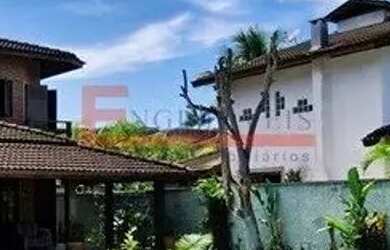 Imagem: A casa possui 4 Dormitórios, 3 Banheiros, 4 Vagas na garagem