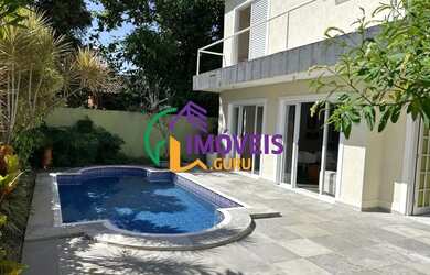 Imagem: A casa em condomínio possui 4 Dormitórios, 5 Banheiros, 278m²