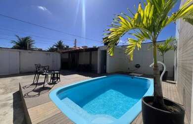 Imagem: A casa possui 5 Dormitórios, Acomodam 20 pessoas, 5 Vagas na