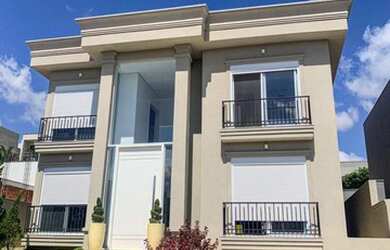 Imagem: A casa em condomínio possui 5 Dormitórios, 5 Banheiros, 4