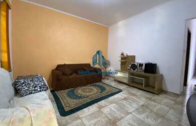 Imagem: A casa possui 3 Dormitórios, 2 Banheiros, 2 Vagas na garagem