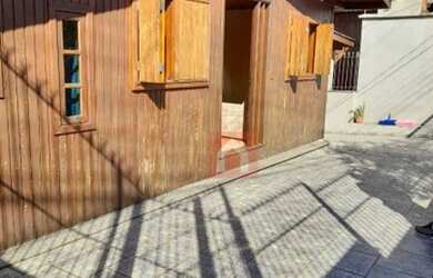 Imagem: A casa possui 3 Dormitórios, 3 Banheiros, 4 Vagas na garagem