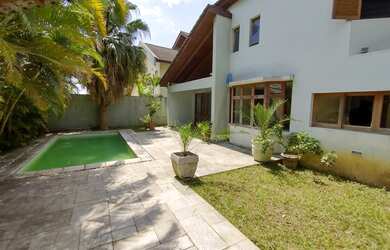 Imagem: A casa possui 3 Dormitórios, 5 Banheiros, 5 Vagas na garagem