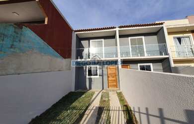 Imagem: A casa possui 2 Dormitórios, 1 Banheiro, 1 Vaga na garagem