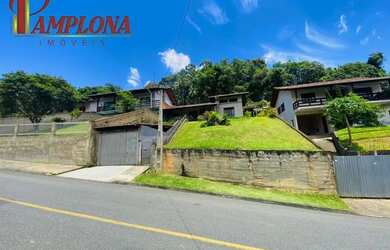 Imagem: A casa possui 3 Dormitórios, 3 Banheiros, 1 Vaga na garagem