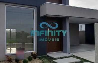 Imagem: A casa possui 3 Dormitórios, 2 Banheiros, 2 Vagas na garagem