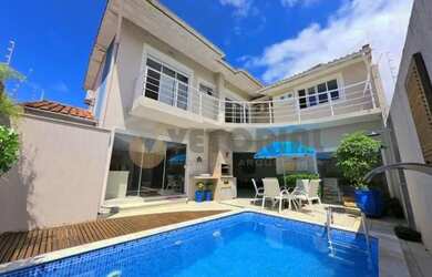 Imagem: A casa possui 5 Dormitórios, 5 Banheiros, 3 Vagas na garagem