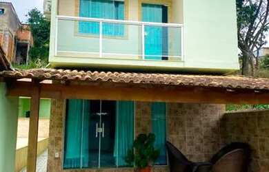 Imagem: A casa possui 4 Dormitórios, 5 Banheiros, 2 Vagas na garagem