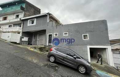 Imagem: A casa possui 4 Dormitórios, 3 Banheiros, 5 Vagas na garagem