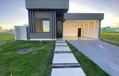 Imagem: A casa possui 3 Dormitórios, 3 Banheiros, 4 Vagas na garagem