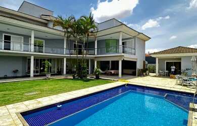 Imagem: A casa em condomínio possui 5 Dormitórios, 5 Banheiros, 5