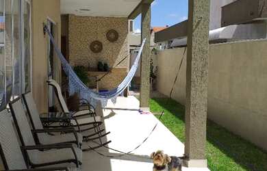 Imagem: A casa em condomínio possui 4 Dormitórios, 5 Banheiros, 4