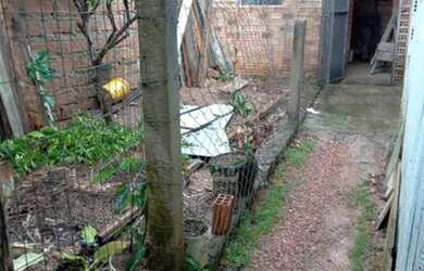 Imagem 7: Vendo uma casa. Churrasqueira, 1 Vaga na garageme2 Dormitórios