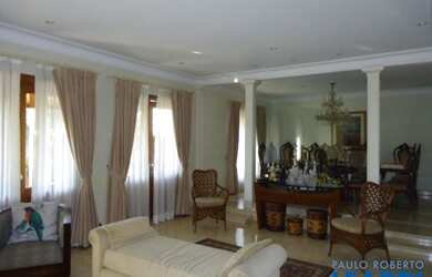 Imagem: A casa em condomínio possui 4 Dormitórios, 5 Banheiros, 4