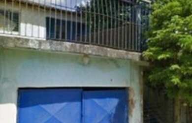 Imagem: A casa possui 3 Dormitórios, 1 Banheiro, 1 Vaga na garagem