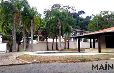 Imagem: A casa possui 3 Dormitórios, 5 Banheiros, 2 Vagas na garagem