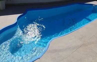 Imagem: A casa possui 3 Dormitórios, 3 Banheiros, 190m² de Área e