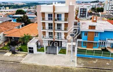 Imagem: O apartamento possui 3 Dormitórios, 2 Banheiros, 2 Vagas na