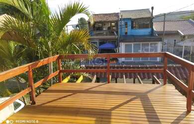 Imagem: A casa possui 2 Dormitórios, 3 Banheiros, 2 Vagas na garagem