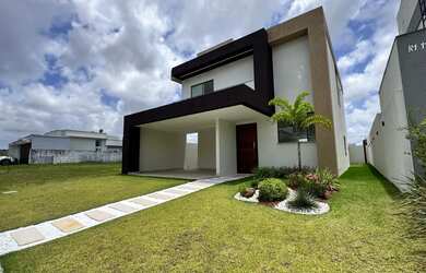 Imagem: A casa em condomínio possui 4 Dormitórios, 5 Banheiros, 2