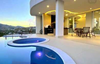 Imagem: A casa em condomínio possui 3 Dormitórios, 5 Banheiros, 4