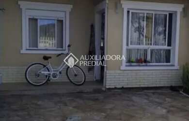 Imagem: A casa em condomínio possui 2 Dormitórios, 1 Banheiro e 52m²