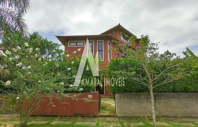 Imagem: A casa em condomínio possui 3 Dormitórios, 3 Banheiros, 2