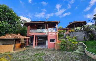 Imagem: A casa possui 2 Dormitórios, 3 Banheiros, 1 Vaga na garagem