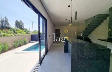 Imagem: A casa em condomínio possui 3 Dormitórios, 5 Banheiros, 4