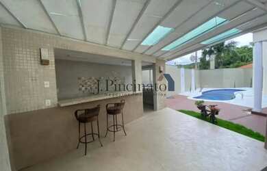 Imagem: A casa em condomínio possui 4 Dormitórios, 5 Banheiros, 4