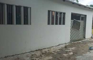 Imagem: A casa possui 3 Dormitórios, 2 Banheiros, 3 Vagas na garagem