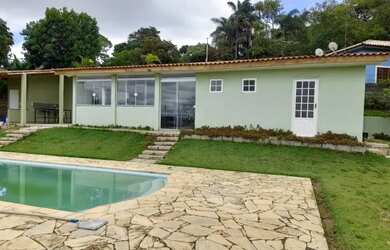 Imagem: A casa possui 5 Dormitórios, 5 Banheiros, 5 Vagas na garagem