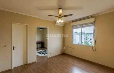 Imagem: O apartamento possui 1 Dormitório, 1 Banheiro, 1 Vaga na garagem