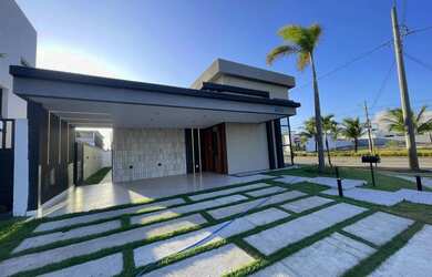 Imagem: A casa possui 3 Dormitórios, 3 Banheiros, 4 Vagas na garagem