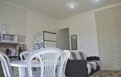 Imagem: A casa possui 2 Dormitórios, 1 Banheiro, 1 Vaga na garagem