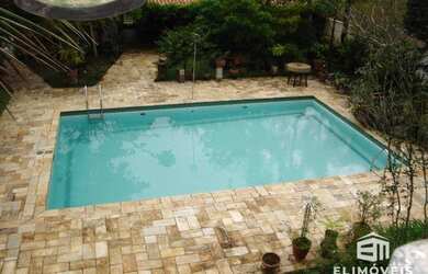 Imagem: A casa em condomínio possui 5 Dormitórios, 2 Banheiros, 5