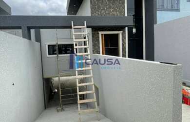 Imagem: A casa possui 3 Dormitórios, 2 Banheiros, 3 Vagas na garagem