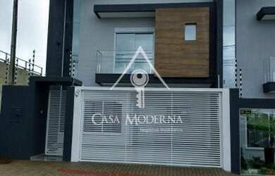 Imagem: A casa possui 3 Dormitórios, 4 Banheiros, 2 Vagas na garagem