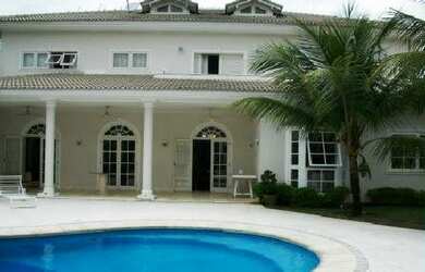 Imagem: A casa em condomínio possui 5 Dormitórios, 5 Banheiros, 4