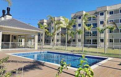 Imagem: O apartamento possui 2 Dormitórios, 1 Banheiro, 1 Vaga na garagem