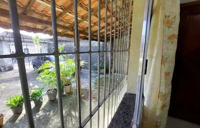 Imagem: A casa possui 2 Dormitórios, 2 Banheiros, 5 Vagas na garagem