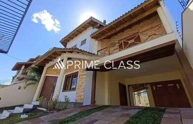 Imagem: A casa possui 4 Dormitórios, 3 Banheiros, 2 Vagas na garagem