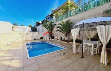 Imagem: A casa em condomínio à venda possui 3 Dormitórios, 5 Banheiros