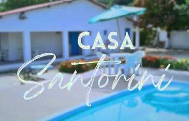 Imagem: A casa possui 4 Dormitórios, Acomodam 15 pessoas, 5 Vagas na