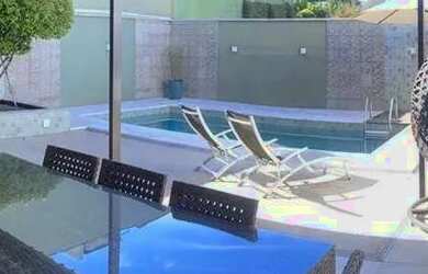 Imagem: A casa possui 4 Dormitórios, 4 Banheiros, 3 Vagas na garagem