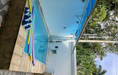 Imagem: A casa em condomínio possui 4 Dormitórios, 3 Banheiros, 2