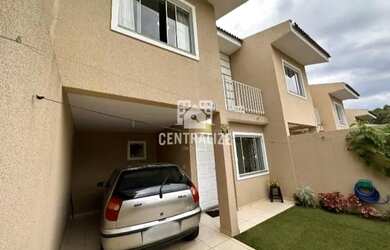 Imagem: A casa possui 4 Dormitórios, 1 Banheiro, 2 Vagas na garagem