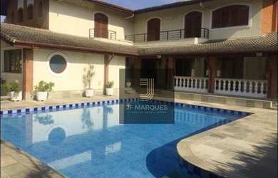 Imagem: A casa em condomínio possui 4 Dormitórios, 5 Banheiros, 5